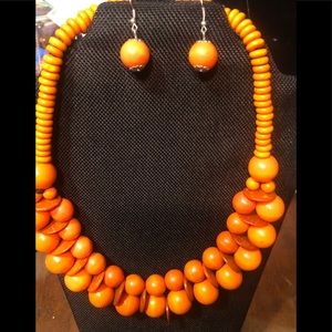 Orange wooden beads with matching earrings